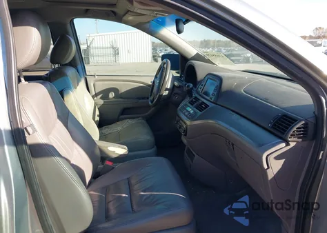 2010 Honda Odyssey Ex-L z USA, uszkodzony, nr VIN 5FNRL3H70AB029048